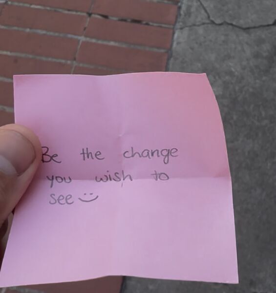Handwritten sticky note with words of encouragement
